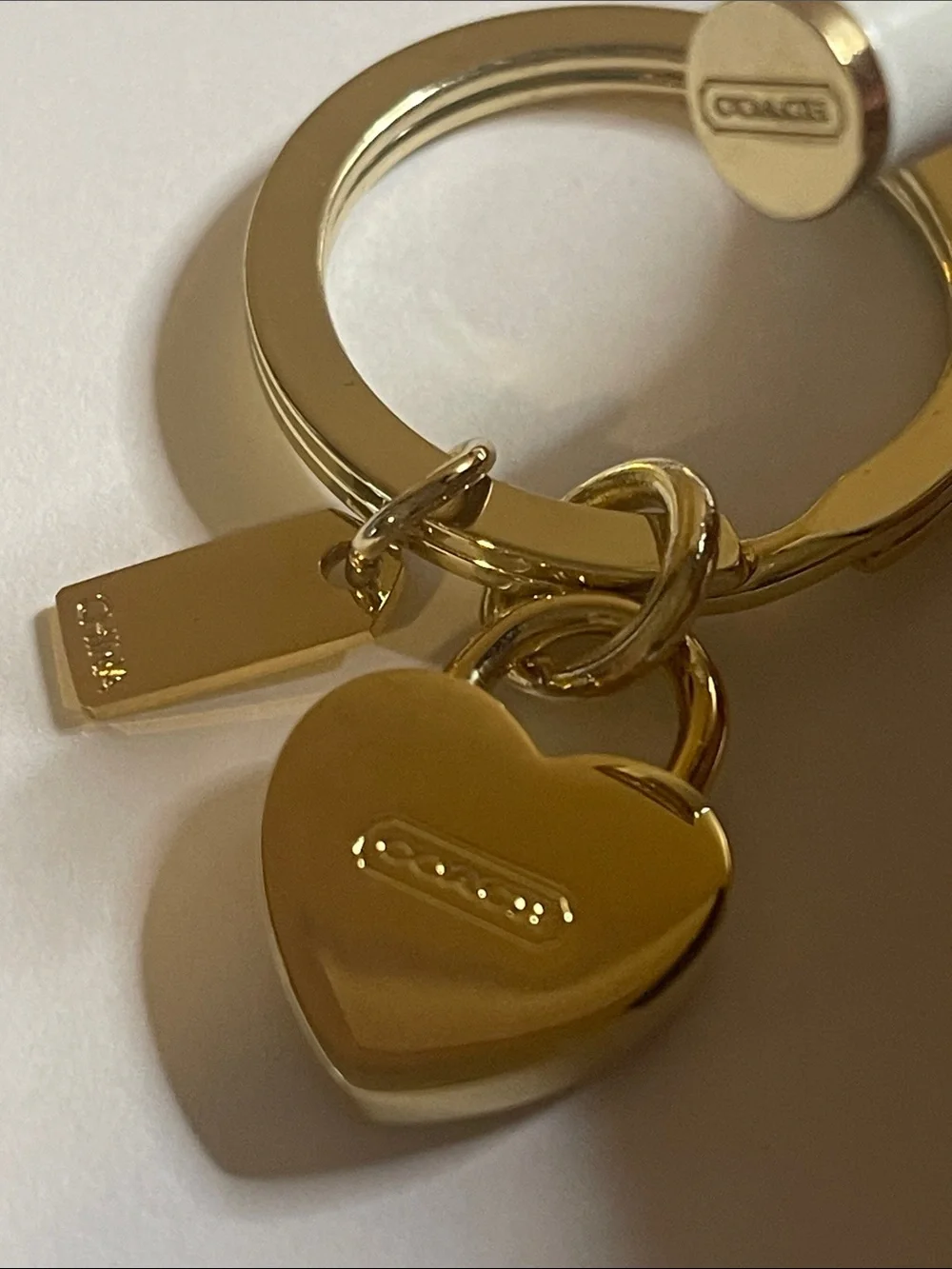 Coach Gold Heart Lock Keychain with Pink Enamel Accent and Coach Pen